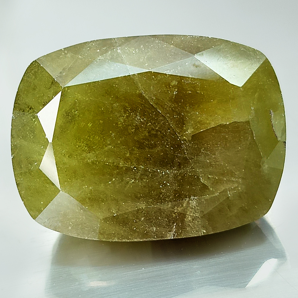 Green Sphene With Rainbow Spark 1.37 Ct. Oval Shape 7.4 x 6.8 Mm. Natural Gem