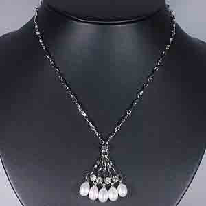 9.16 G. Natural White Pearl Nickel Necklace Unheated
