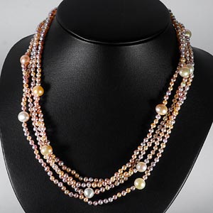 239.25 Ct. Natural Orange Pearl Strands 78 Inch Unheated