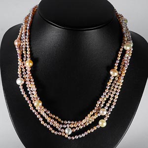 243.60 Ct. Lively Natural Orange Pearl Strands 78 Inch