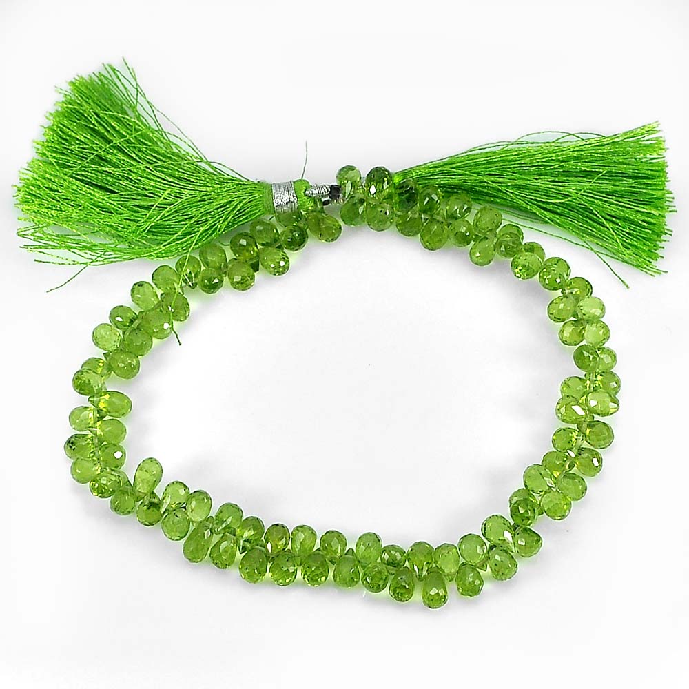 95.40 Ct. Natural Green Peridot Beads Long 9 Inch Briolette Cut 6 x 4 Mm.