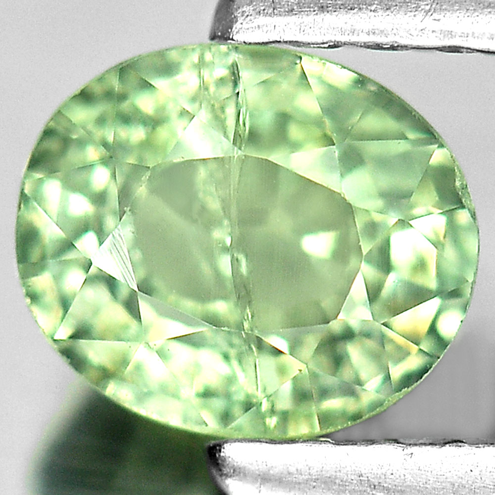 0.74 Ct. Oval Natural Yellowish Green Sapphire Gem