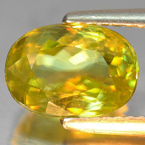 2.42 Ct. Oval Natural Green Titanium Sphene With Rainbow Spark
