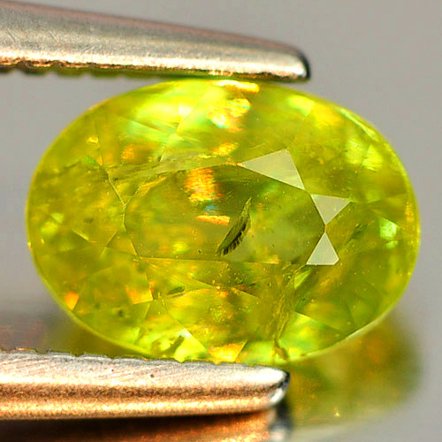 0.97 Ct. Beauteous Oval Natural Yellowish Green Titanium Sphene Rainbow Spark