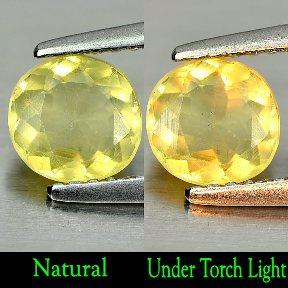 0.85 Ct. Shinning Oval Natural Yellow Green Titanium Sphene With Rainbow Spark