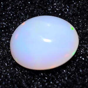 0.58 Ct. Oval Cab Natural Multi Color Opal Unheated Gem