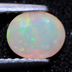 0.57 Ct. Oval Natural Multi Color Opal Sudan Unheated
