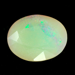 0.58 Ct. Oval Natural Multi Color Opal Sudan Unheated