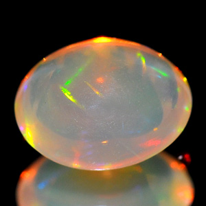 0.55 Ct. Oval Cab Natural Gem Multi Color Opal Unheated