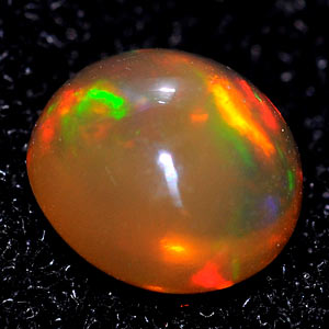0.56 Ct. Oval Cab Natural Multi Color Opal Sudan Gem