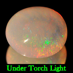 0.58 Ct. Oval Cab Natural Multi Color Opal Sudan Gem