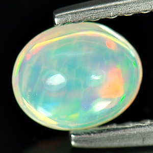 0.41 Ct. Natural Multi - Color Play Of Colour Opal Oval Cab Unheated