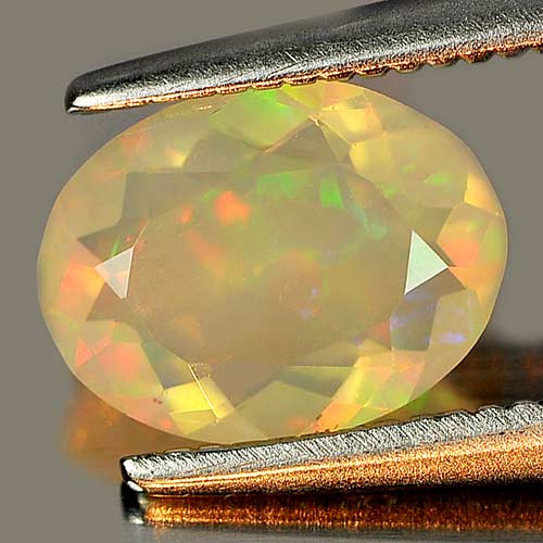 0.59 Ct. Attractive Oval Shape Natural Multi Color Play Of Colour Opal Gem