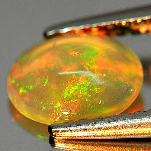 0.58 Ct. Nice Oval Cabochon Natural Gem Play Of Colour Multi Color Opal
