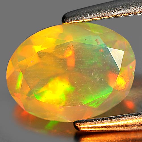 0.59 Ct. Good Oval Shape Natural Multi Color Play Of Colour Opal Gem