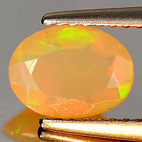 0.57 Ct. Sz 8 x 6 Mm. Oval Natural Multi Color Play Of Colour Opal Gem