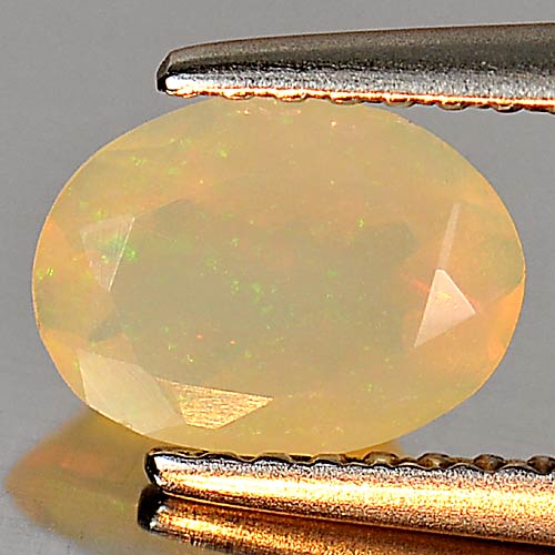 0.58 Ct. Oval Shape Natural Multi Color Play Of Colour Opal Gem
