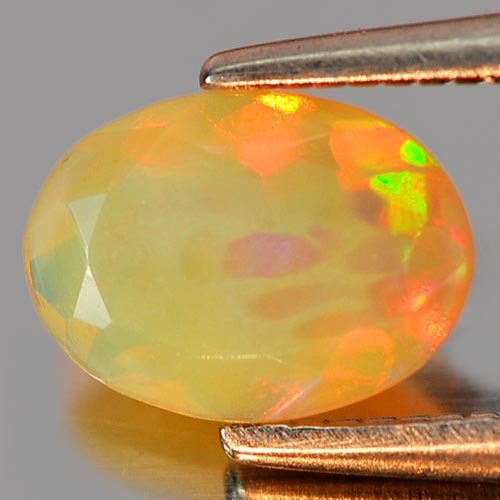 0.60 Ct. Alluring Oval Natural Gem Multi Color Play Of Colour Opal