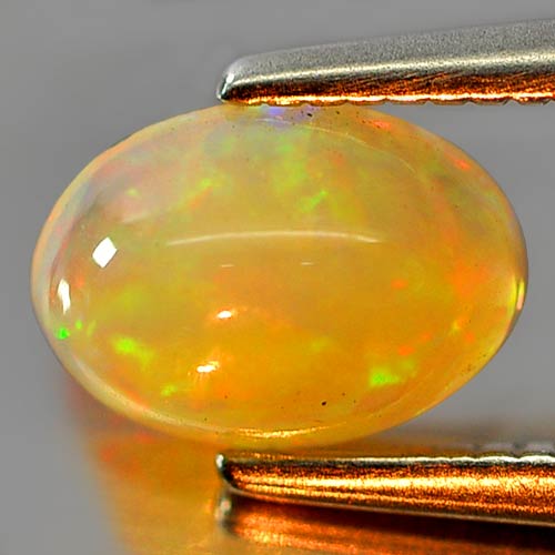 0.55 Ct. Delightful Oval Cab Natural Gem Multi Color Play Of Colour Opal