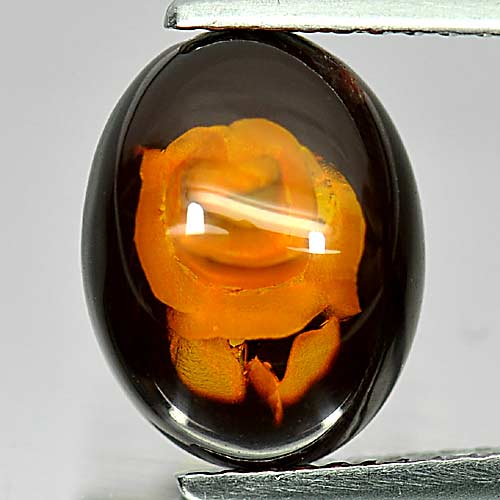 Natural Gem 0.84 Ct. Oval Cabochon Flower Carving In Brown Yellow Amber
