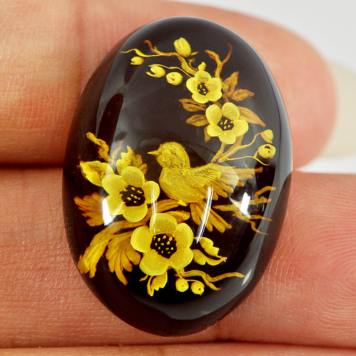 15.38 Ct. Oval Cab Natural Flower and Bird Carving In Brown Yellow Amber Poland
